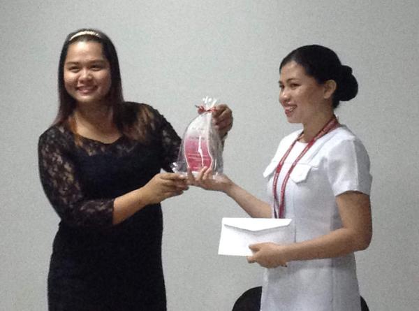 Rose Udtuhan receives a recognition from Rose Pharmacy SM Branch. 