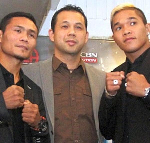 ALA Promotions International President and CEO Michael Aldeguer (centre) flanked by his prized wards Donnie "Ahas" Nietes and "Prince" Albert Pagara. (DONG SECUYA)