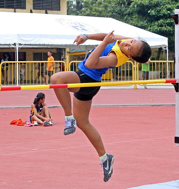 Jhuvan Jehn Baculot of UC shows her wining form in the Cesafi athletics secondary girls high jump competition.  (CDN PHOTO/LITO TECSON)
