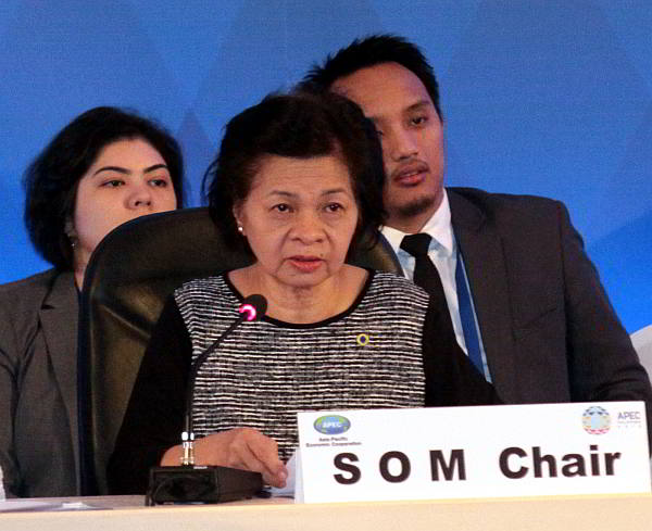 Foreign Affairs Undersecretary Laura del Rosario, chairperson of the Senior Officials meetings (SOM) addresses APEC delegates at the Radisson Blu Hotel. (CDN Photo/Junjie Mendoza)