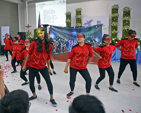 The Cebu Daily News dance crew don masks during their performance at the SM Trade Hall. (CDN PHOTO/LITO TECSON)