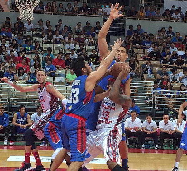 Sonny Thoss and Ranidel de Ocampo of Gilas Pilipinas apply swarming defense on an American player during their Jones Cup match last night in Taipei. (Inquirer)