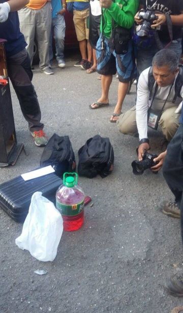 A water bottle filled with gasoline was also found inside the car. (CDN Photo Apple Mae Ta-as)