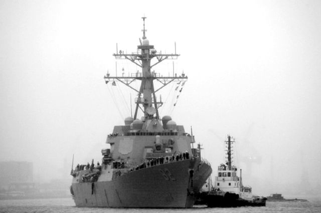 Guided missile destroyer USS Lassen arrives at the Shanghai International Passenger Quay in Shanghai, China, for a scheduled port visit in this April 8, 2008 photo. (AP)