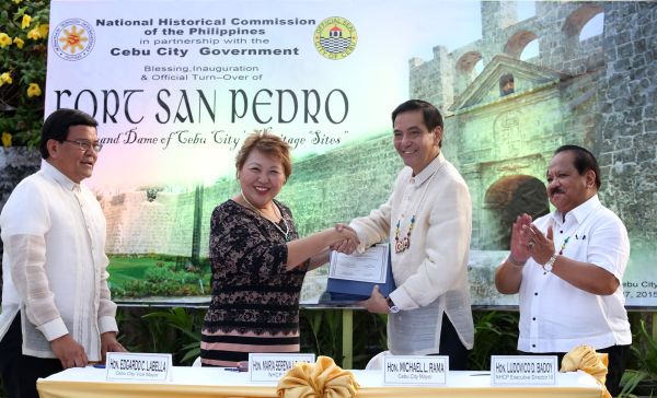 Cebu City mayor Michael Rama (3rd from left) receives the Memorandum of Agreement (MOA) officially turning over the restored Port San Pedro to the Cebu City government from the National Heritage Commission of the Philippines (NHCP). Maria Serena I. Diokno, (2nd from left), NHCP chairperson, represented the heritage commission during yesterday's turnover ceremony. (CDN PHOTO/JUNJIE MENDOZA)