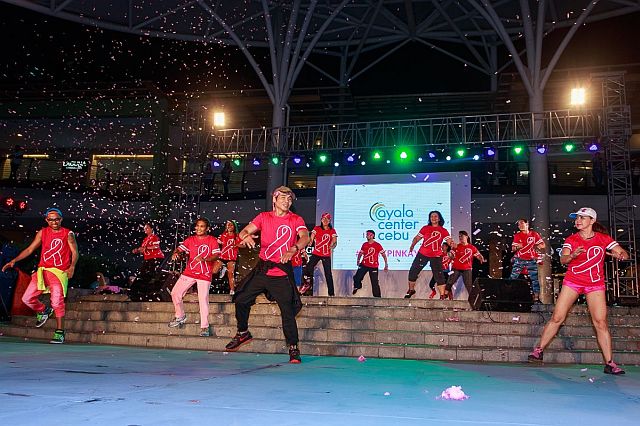 Dancers lead other participants during the Pink Zumba Fitness Party at The Terraces at the Ayala Center Cebu.