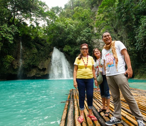 Kawasan Falls is among the popular tourist destination in southern Cebu. Seen in this January 2014 photo is Vice Gov. Agnes Magpale with Suroy-Suroy Sugbo tourists.