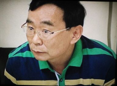 Arrested shooter Li Qing Liang. (Source: ABS-CBN VIDEO)