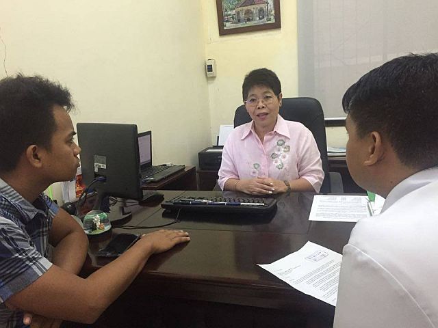 Vice President of the SWU student body Danny Toralba and SWU med governor Krenz Yaba meet with Atty. Pacita Isagan, CHED chief administrative officer at the CHED regional office.
