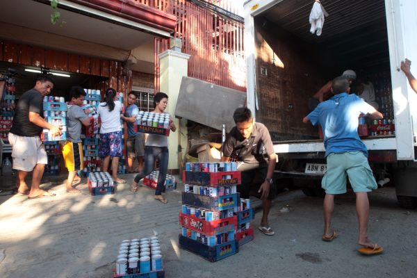 Butane canisters were loaded up in a truck after a fire broke out at the house of businesswoman Amor Pelenia injuring eight people. (CDN PHOTO/TONEE DESPOJO)
