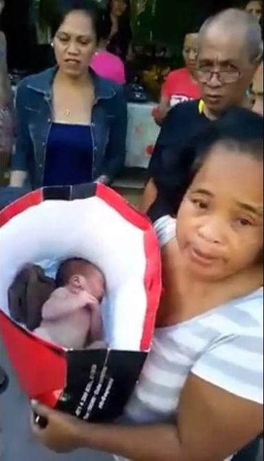 Unless the mother of this baby boy comes forward, he'll be put up for adoption. The infant was found in a shopping bag left by the road in barangay Basak, Lapu-Lapu City. (SCREEN GRAB FROM LUZ MENDOZA'S VIDEO ON FB)