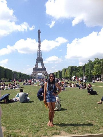 Cebuana  Romila Parcon poses in front of the Eiffel Tower in Paris. (Romila Parcon's Facebook account)