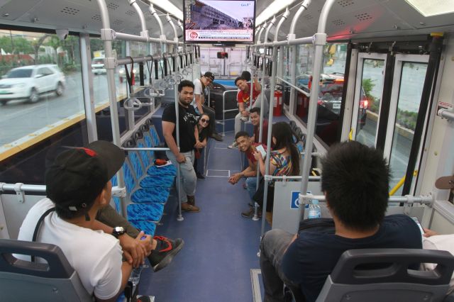 Day one of the dry run has SM employees enjoying a free ride on an air-conditoned MyBus that shuttles between SM Cebu and the new Seaside City mall in the South Road Properties. The bus can carry 50 passengers and has CCTV cameras. (CDN PHOTO/TONEE DESPOJO)
