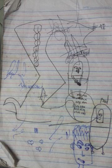 A scribble purportedly giving clues as to what happened to a nine-year-old girl who was found dead in a river in barangay Binaliw, Cebu City last month. (CDN PHOTO APPLE MAE TA-AS)