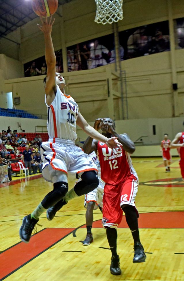 Jasper Parker of SWU goes for lay-up in a game against the University of the East last May 2014 at the Hoops Dome in Lapu-Lapu City.