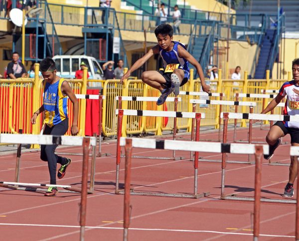 Rick Angelo Sotto of CIT-U shows his gold medal-winning form in elementary boys high jump of the 2015 Cebu City Olympics at the Cebu City Sports Center. (CDN PHOTO/LITO TECSON)