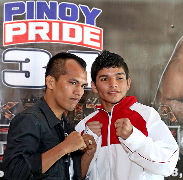 Milan "El Melindo (left) poses with his Mexican opponent Victor Emmanuel Olivo after the final press conference of the Pinoy Pride 34 yesterday at the Fiesta Bay Seafood Restaurant in Lapu-Lapu City. They will clash this Saturday at the Hoops Dome. (CDN PHOTO/LITO TECSON)
