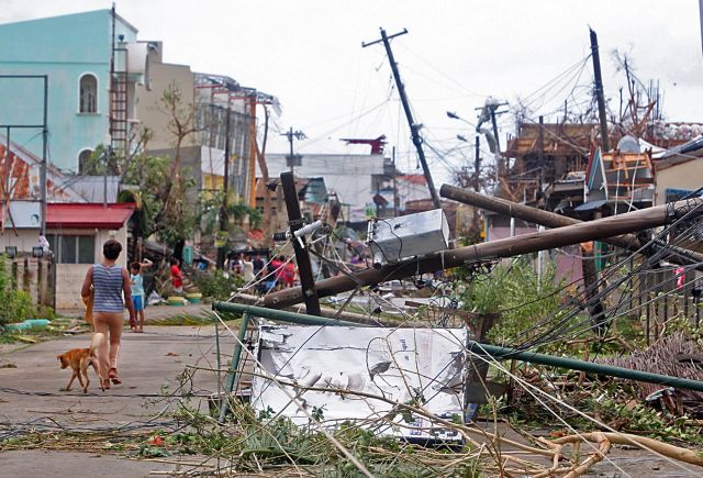 Damage by supertyphoon Yolanda in a street leading to the municipal hall of Daanbantayan town, where the eye of the storm visited northern Cebu in Nov. 8, 2013.