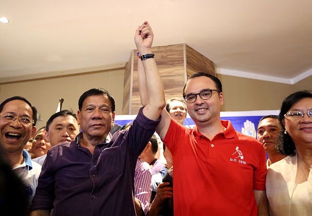 Davao City Mayor Rodrigo Duterte with Sen. Allan Peter Cayetano during their proclamation as candidates for president and vice president, respectively, at the Century Park Hotel in Pasay City. (INQUIRER PHOTO)