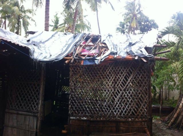 The Seraspes damaged house in barangay Maya, Bogo City after supertyphoon Yolanda's fury two years ago. (CONTRIBUTED PHOTO)