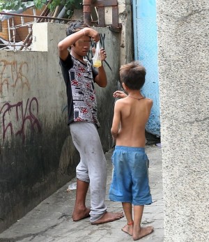 SILOY IS WATCHING: This two young boys seen at Jakosalem street barangay Sto Niño sharing a plastic of rugby glue they use for sniffing that cuase danger to their health. ATTENTION: BARANGAY STO NIÑO OFFICIALS