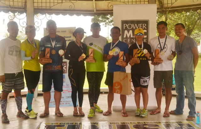 Lao Ogerio (sixth from left) is joined by (from left) race director Edwin Colina, Elaine Pang, Michael Dauz, women's winner Analiza Usaraga, Nick of K1 Sportswear, Roselle Abajo, Edwin Silagan and Rodney Cabahug in the awarding ceremony.