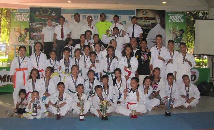 Participants and officials of the first Hayashi-Shitoryukai Karatedo Cup pose for the camera with their medals after the tournament last Saturday at the Insular Square Mall in Mandaue City.