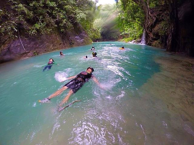 Adventure lovers savor a cool river after canyoneering in Alegria town. (ALEGRIA CANYONEERING FACEBOOK ACCOUNT)