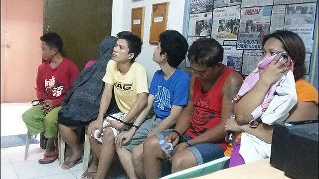 The Arquillano family from San Francisco town on Camotes Island are detained at the Provincial Intelligence Branch (PIB) of the Cebu Provincial Police Office. (CDN PHOTO/APPLE TA-AS)