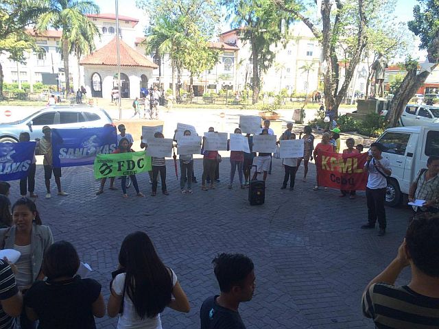 Urban poor groups gather at Plaza Sugbo after Cebu City Council approved  the 1 year moratorium to postpone all demolition undertaken by the city government. (CDN PHOTO/JOSE SANTINO S. BUNACHITA)