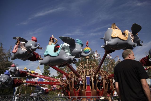 Visitors enjoy the Dumbo the Flying Elephant ride at Disneyland in Anaheim, California, in this January 2015 photo. Disneyland is one of the theme parks near Los Angeles, California. (AP PHOTO)