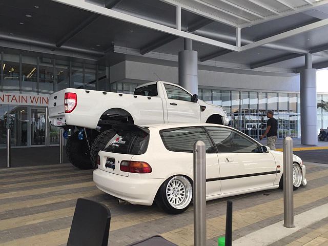 HIGH AND LOW. A Bigfoot Ford Ranger single cab makes an impact when parked beside a stunning Honda Civic EG.
