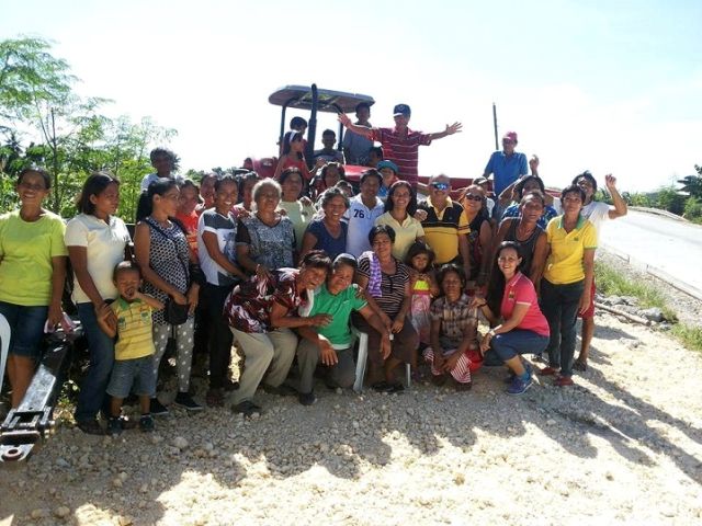 Members of Hacienda Filomena Agrarian Reform Beneficiaries Association in barangay Binabag, Bogo City, receive a tractor with implements worth P4,154,800. (CONTRIBUTED PHOTO)