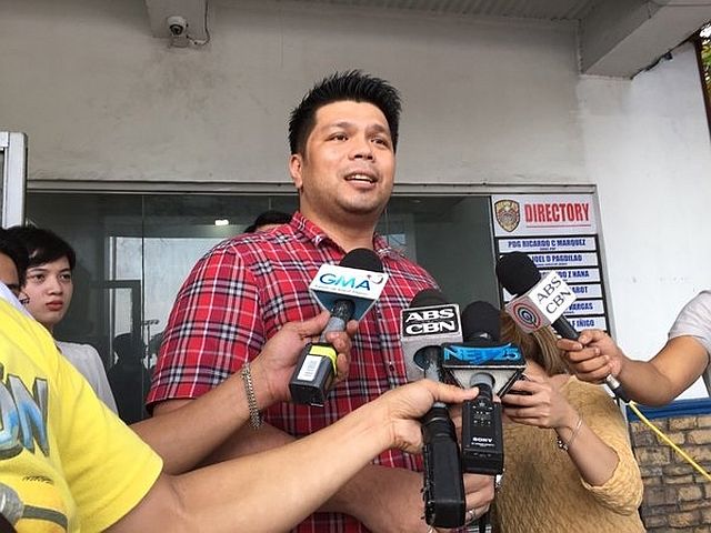 Former Iglesia ni Cristo minister Lowell Menorca answers questions from the media minutes after he was released from detention. (INQUIRER PHOTO)