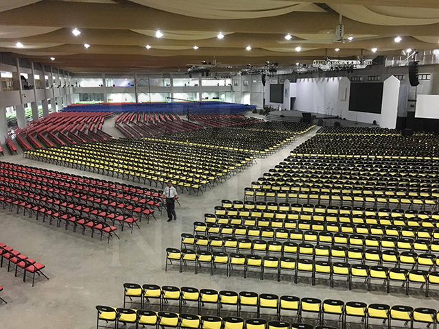 Color-coded seats for 15,000 people are set up in the IEC Pavilion. (CDN PHOTO/EILEEN G. MANGUBAT)