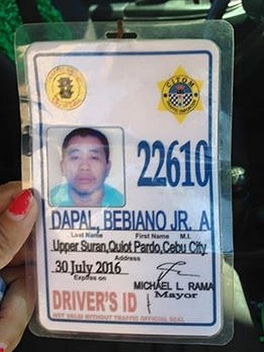 ID of Bebiano Dapal Jr., the taxi driver who allegedly cursed and asked P2,000 from his passenger. (contributed photo)