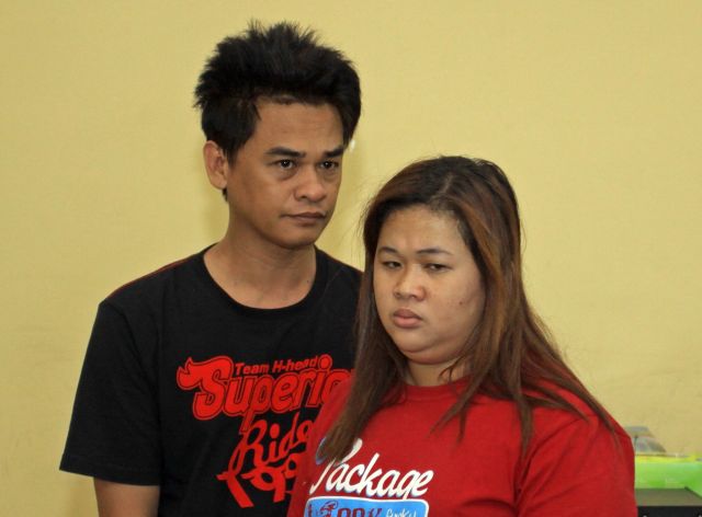 Couple Mheann and Nelson Lacsa were presented before the press after their arrest in Manila for allegedly recruiting a Cebuana to work in their bar for paid sex. (CDN PHOTO/LITO TECSON)