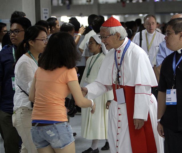 Joseph Cardinal Zen Ze-Kiun of Hong Kong is greeted by Asian delegates at  the IEC Pavilion where he gave a testimony about the struggle of Catholics in China. (CDN PHOTO/LITO TECSON)