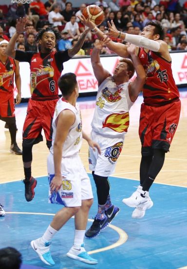 June Mar Fajardo grabs a rebound over Rain or Shine's Beau Belga in Game 1 of their Best-of-7 semifinal series of the 41st PBA Philippine Cup at the Mall of Asia Arena last night. (INQUIRER PHOTO)