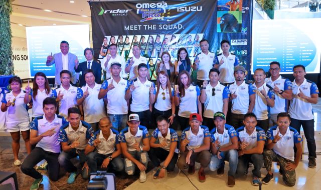 Members, team officials and sponsors of the Omega Pro Triathlon team flash the no. 1 sign as they were presented to the media during a press conference at the Robinson's Galleria Atrium yesterday. (CDN PHOTO/JUNJIE MENDOZA)