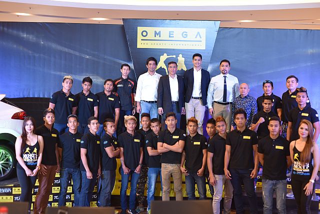 Pio Castillo Jr. (6th from left, 2nd row), President and Chairman of International Pharmaceuticals Inc. (IPI), his son Pio Paulo Castillo (7th from left), President of Omega Pro Sports Internatiol, and Chad Canares (8th, from left 2nd row) Vice President of Omega Pro Sports, lead the launching of Who’s Next? Pro Boxing Series last week at the Robinsons Galleria Cebu Atrium. (CONTRIBUTED PHOTO)