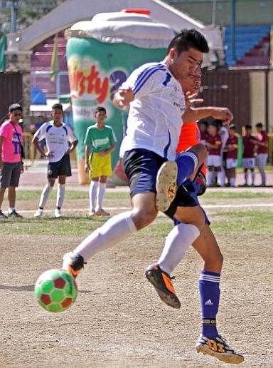 THIRSTY FOOTBALL CUP 2016/FEB.21,2016:Tacloban United booter manage to hit  the Hiroshi booter during their game in Thirsty Football cup 2016 at Cebu City Sports center.Hiroshi win the game.(CDN PHOTO/LITO TECSON)