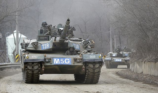 South Korean army K-1 tanks move during the annual exercise in Paju, near the border with North Korea. (AP PHOTO)