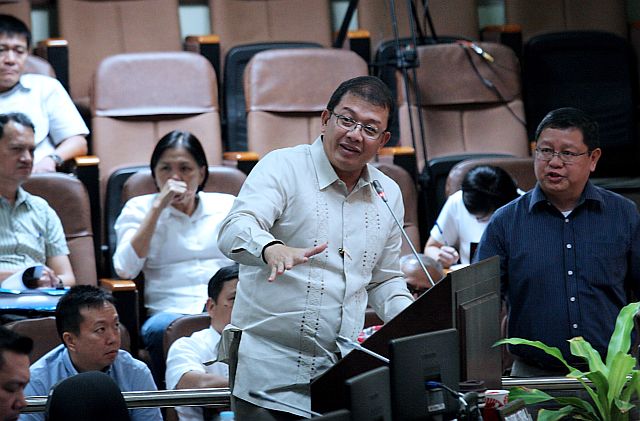 CEBU CITY CORDOVA 3RD BRIDGE/MARCH 16, 2016: Atty. Aristotle Batuhan (left) and Dante Bautista (right) consultants of Metro Pacific Tall Ways answer questions from the members of the City council during executive session asking the city council to pass a resulotion authorizing mayor Michael Rama to enter into a joint venture agreement with MPTDC for the emplementation of the Cebu-Cordova bridge project during the executive session last wednesday.(CDN PHOTO/JUNJIE MENDOZA)