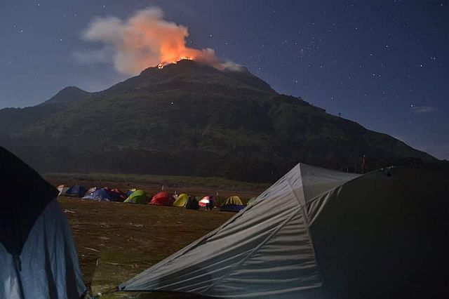 MT. APO FIRE / MARCH 28, 2016 Trekkers who evacuated Mt. Apo Sunday watch from safe distance the burning portion of the country's highest peak in these photos snapped by Ryan Mark Asturias, a climber from Koronadal City.