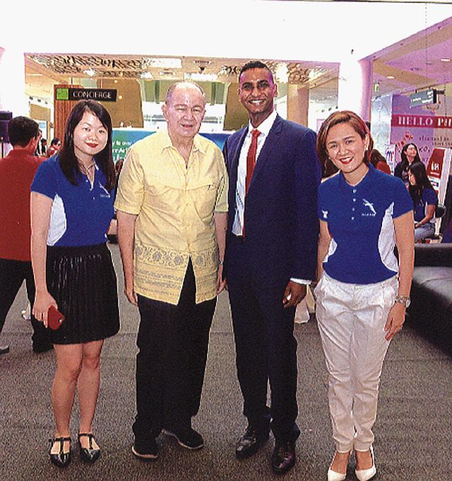 That’s me with Silkair’s Ganesh Perumal (center), flanked by Christine Chua (left), and Kristine Dianne Lim.
