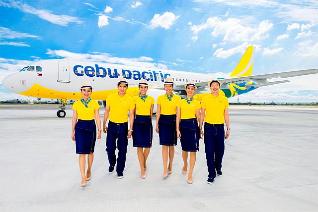 CEBUANO GOLD! That Midas touch that Cebuano design can bring to Cebu Pacific’s new cabin crew uniforms, designed by Jun Escario in time for CEB’s 20th birthday. This year also marked the rollout of the new livery on the aircraft  (notice the cheery yellow underbelly), featuring the streamlined new logo using the lowercase variation of a custom font.