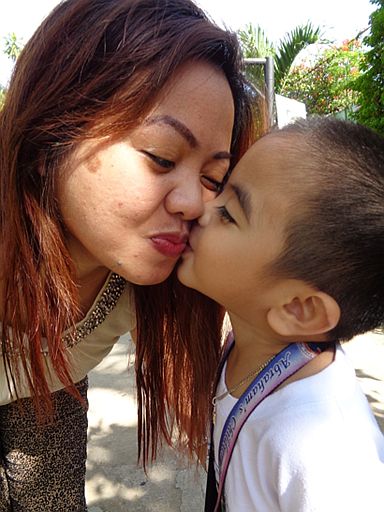 Work-frm-home mom Jilda Aying takes time off from her busy schedule to bring her 4-year- old son, Uno, to school. (CONTRIBUTED PHOTO/FRAULINE MARIA SINSON)