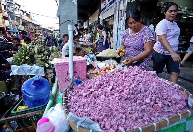 A vendor at Carbon market arranges her binignit ingredients for the meal that Cebuanos prepare on   Good Friday. (CDN PHOTO/LITO TECSON)