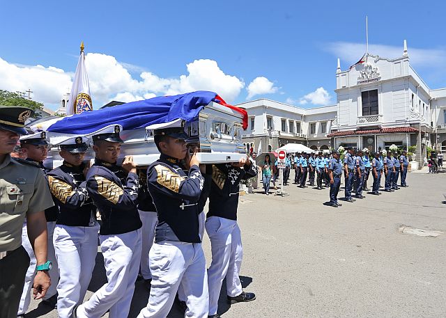 TEDDY'S BURIAL/MARCH 5, 2016: School cadets carry the coffin containg the body of Cebu 6th district provincial board member and former Mandaue City mayor Thadeo Ouano as it was procession from St Joseph shirne to the Mandaue City hall building for a short program before the cremation of the body.(CDN PHOTO/JUNJIE MENDOZA)